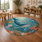 Kartela Ocean Friends washable ocean animals round rug in a playroom next to toy shelves