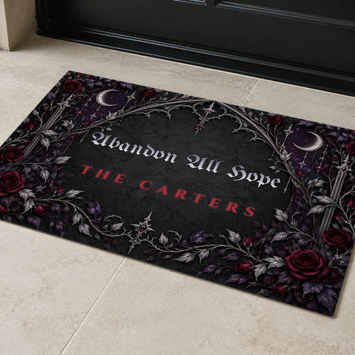 Abandon Hope personalized funny gothic family doormat with sample text "Abandon All Hope, The Carters", on a stone porch in front of the door