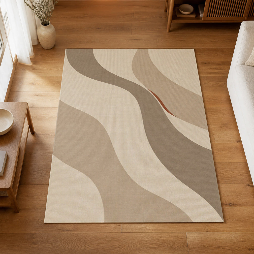 Kartela Flow washable modern wave area rug in Beige, on a wooden floor in a bright living room