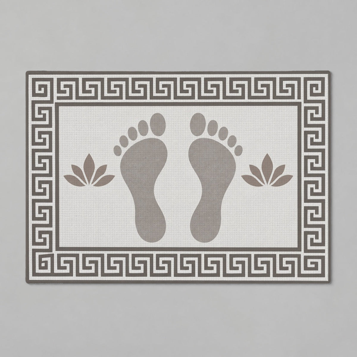 Kartela Footprints washable footprint bath mat in Light Gray, flat product view on a gray background