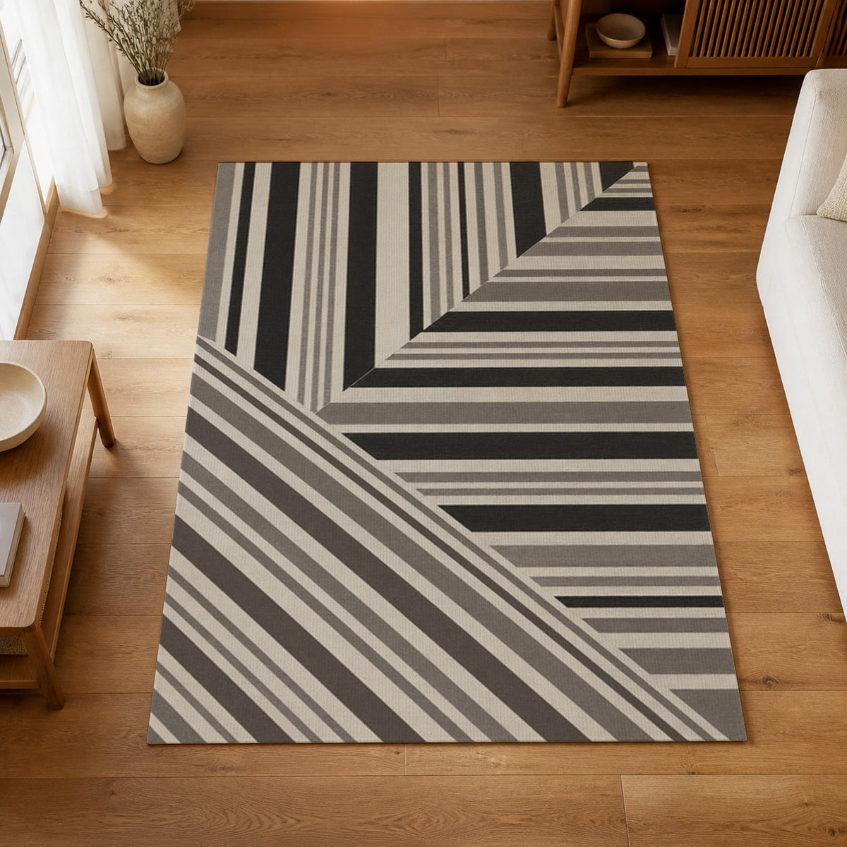 Kartela Block Stripe washable modern striped area rug in Charcoal, on a wooden floor in a bright living room
