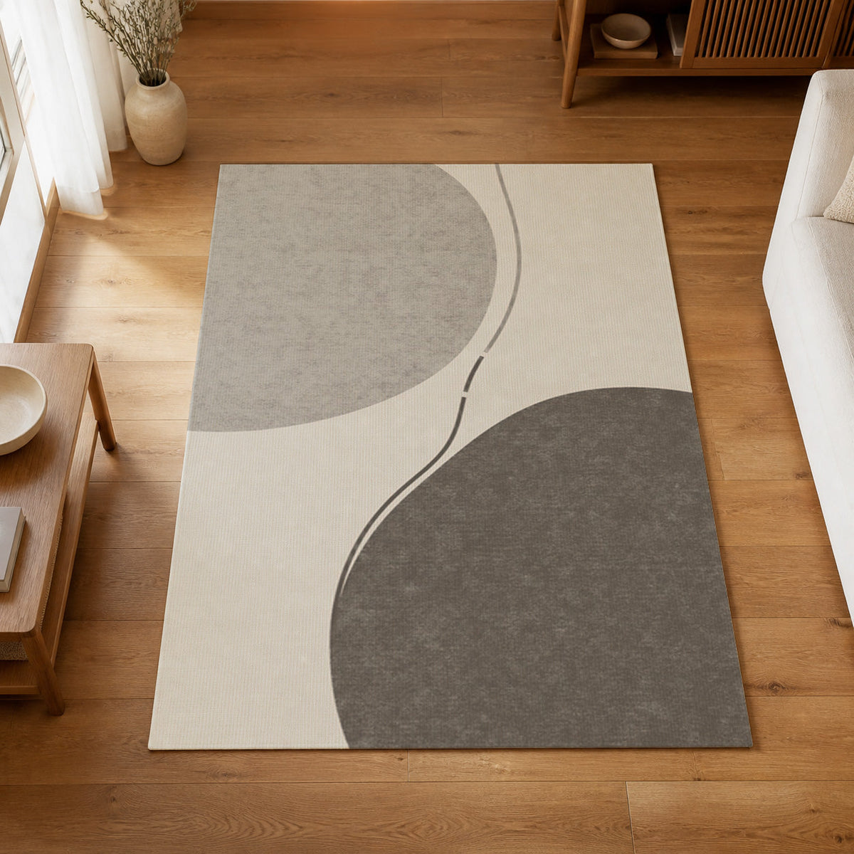 Kartela Balance washable abstract modern area rug in Light Gray, on a wooden floor in a bright living room