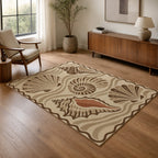 Kartela Seashell washable coastal seashell area rug in Beige, in a living room with an armchair and sideboard