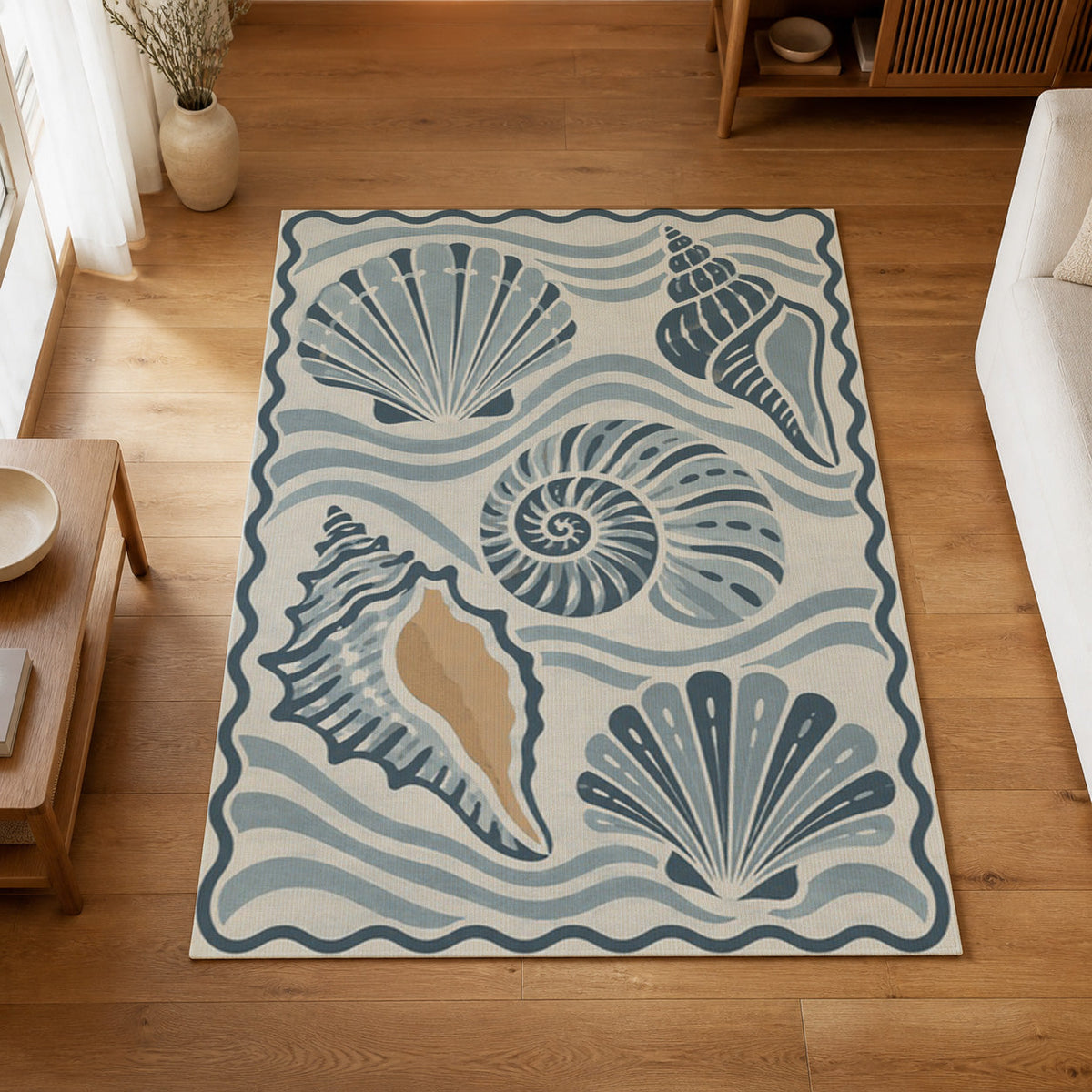 Kartela Seashell washable coastal seashell area rug in Blue, on a wooden floor in a bright living room