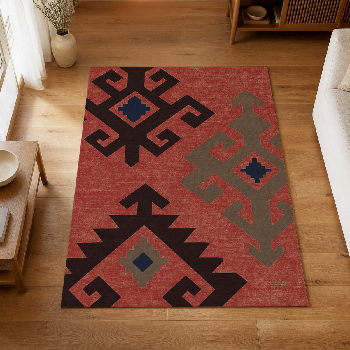 Kartela Woven Traces washable kilim pattern area rug in Red, on a wooden floor in a bright living room