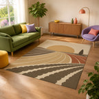 Kartela Sunfield washable modern landscape area rug in Beige, in a sunny living room with a green sofa