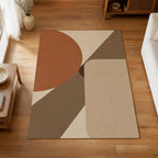 Kartela Intersect washable geometric modern area rug in Beige, on a wooden floor in a bright living room
