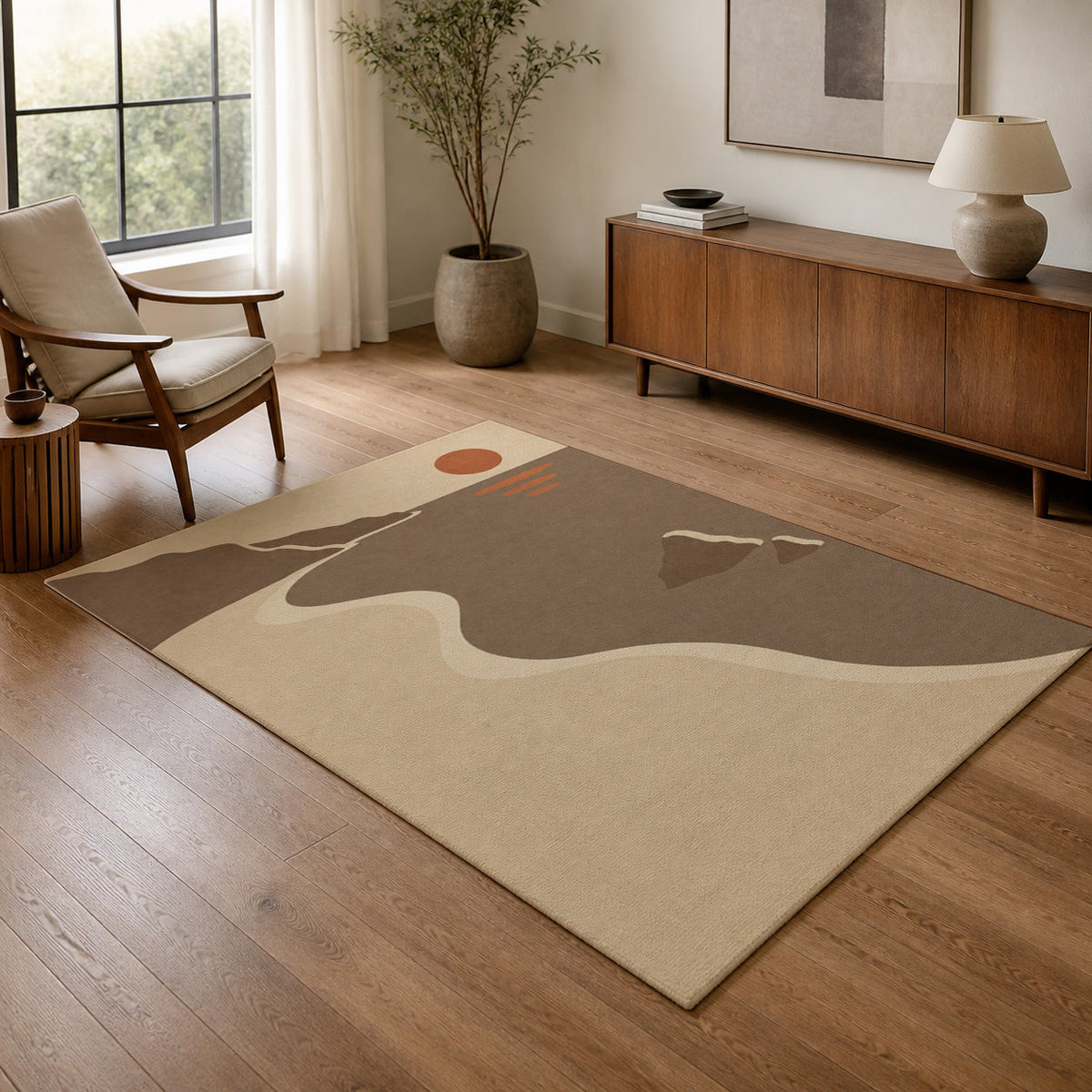 Kartela Shoreline washable coastal sunset area rug in Beige, in a living room with an armchair and sideboard