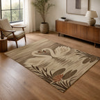 Kartela Swan Lake washable swan area rug in Beige, in a living room with an armchair and sideboard