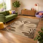 Kartela Swan Lake washable swan area rug in Beige, in a sunny living room with a green sofa