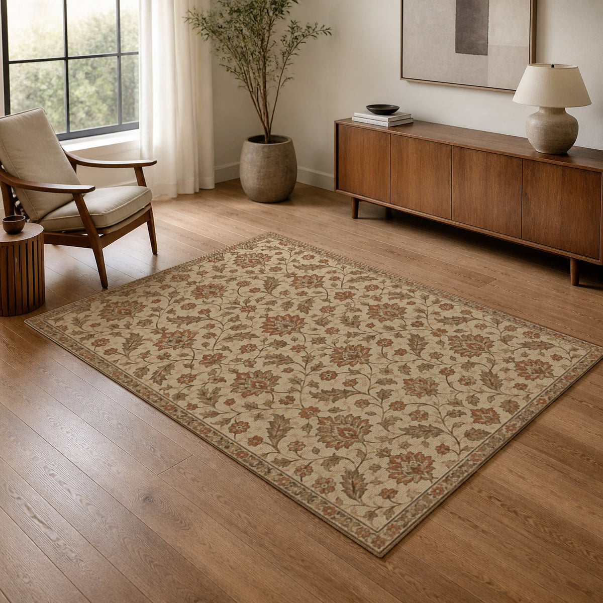 Kartela Persian Field washable vintage Persian style area rug in Beige, in a living room with an armchair and sideboard