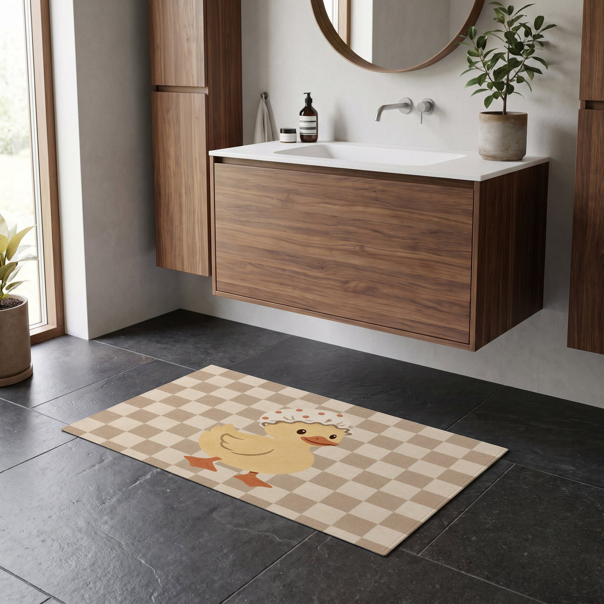 Kartela Duck Check washable checkered duck bath mat in Beige, on a dark tile floor in front of a wooden vanity