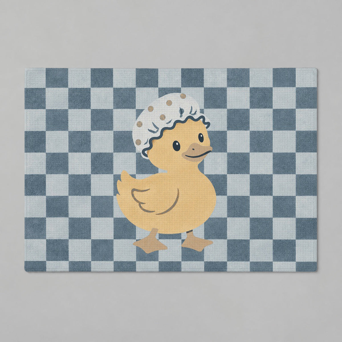 Kartela Duck Check washable checkered duck bath mat in Blue, flat product view on a gray background