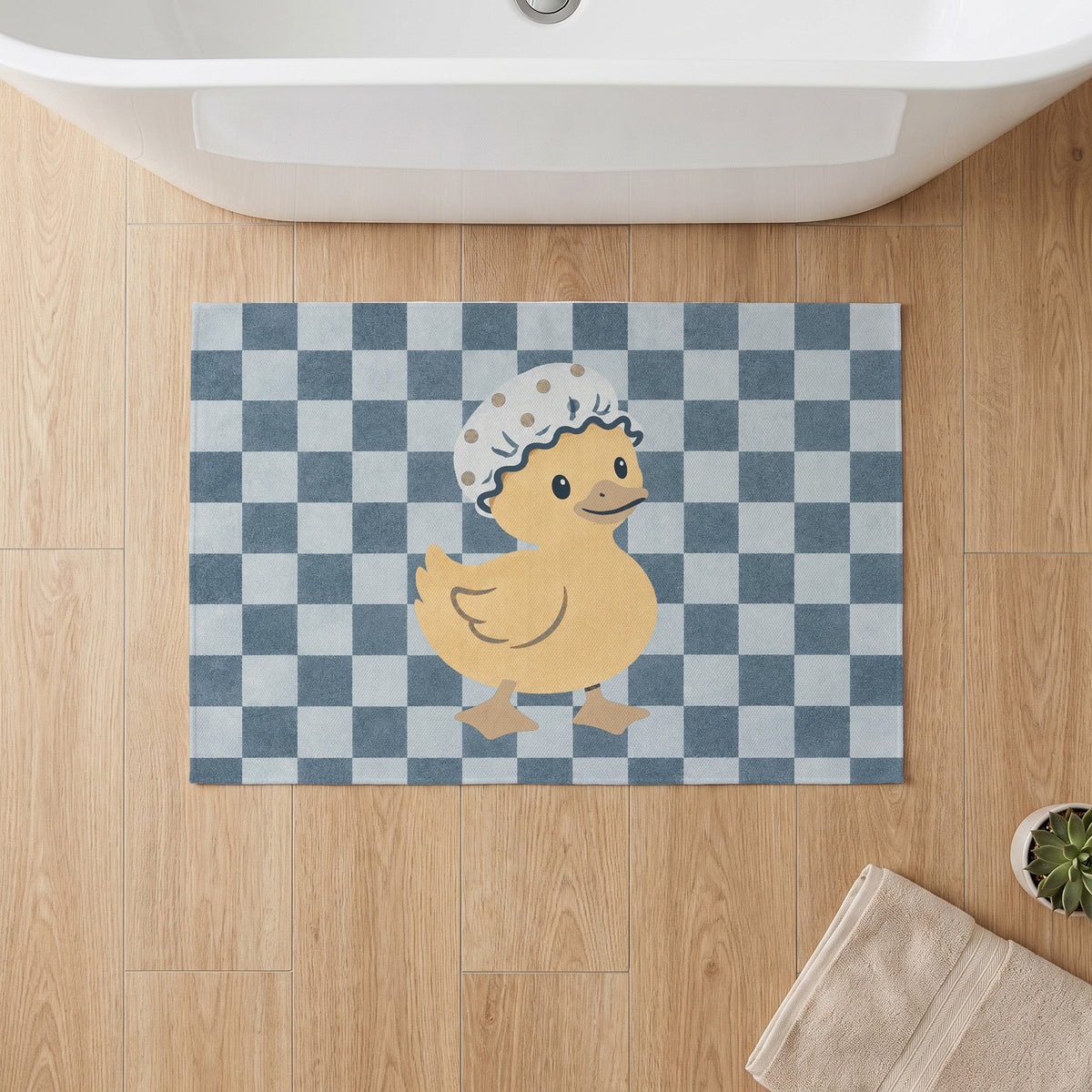 Kartela Duck Check washable checkered duck bath mat in Blue, on a wooden floor in front of a bathtub