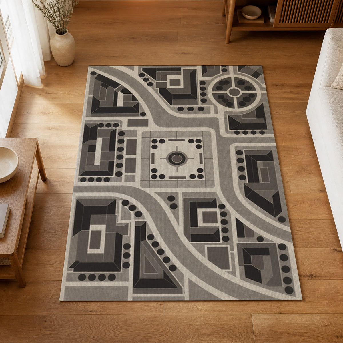 Kartela City Plan washable geometric map area rug in Charcoal, on a wooden floor in a bright living room