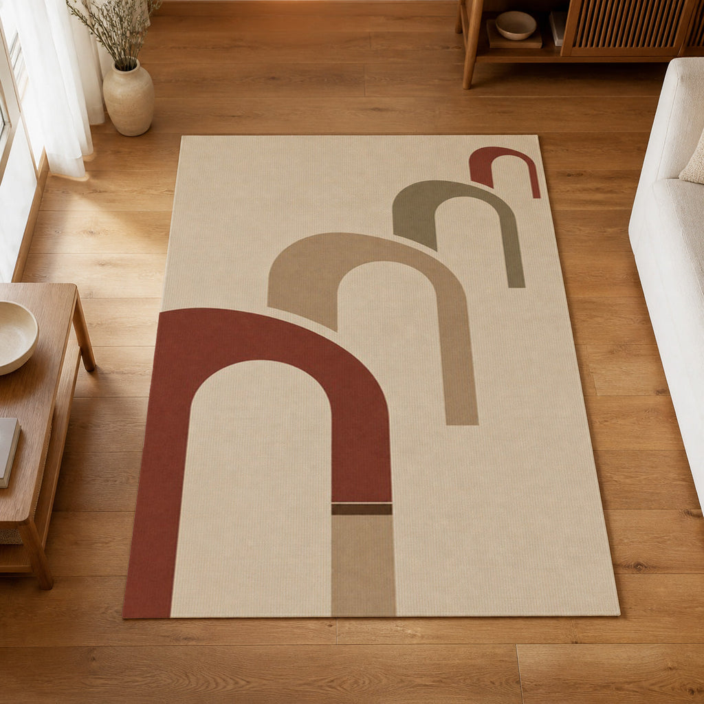 Kartela Echo washable modern arch pattern area rug in Beige, on a wooden floor in a bright living room