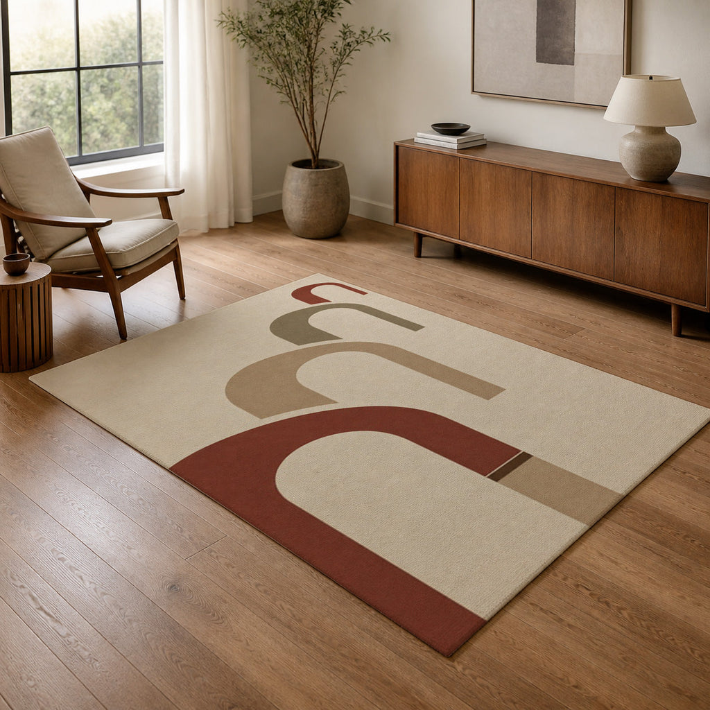 Kartela Echo washable modern arch pattern area rug in Beige, in a living room with an armchair and sideboard
