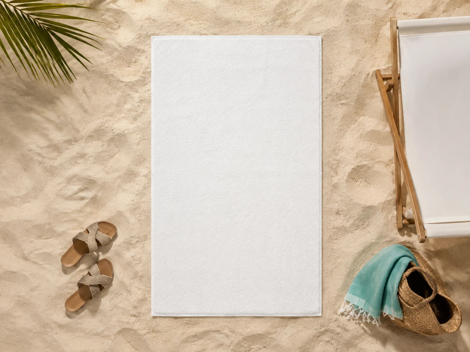 Beach towel beside a person for an easy visual comparison of towel sizes
