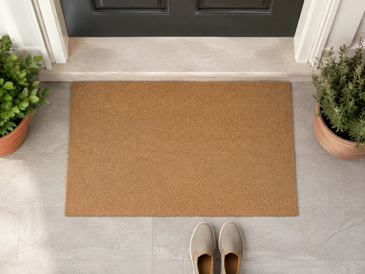 Front doorway showing the scale of three doormat sizes